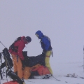 Setting up the camp in wind and snow